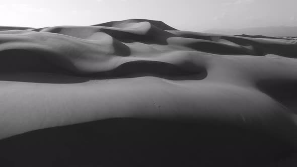  Aerial Drone View Flying By Beautiful Wavy Sand Dunes in Golden Sunset Light