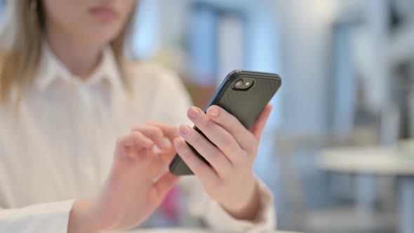 Woman Hands Browsing Smartphone Close Up