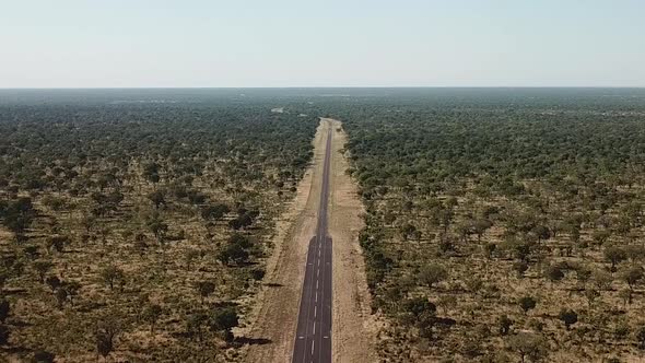 Aerial View Road in South Africa on the Savannah, Kalahari Nabib  Desert  the Road in Rural Botswana