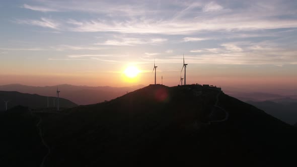 Wind Turbines in mountain during sunset