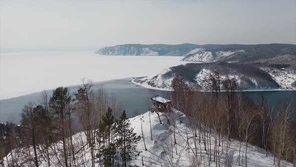 Angara Riverbed in Winter Aerial View of the Confluence of Angara River with Lake Baikal.