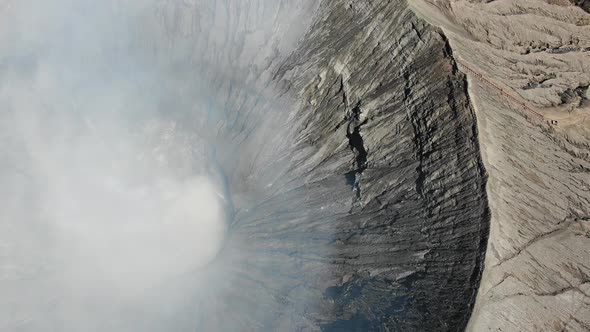 Smoke on Ijen volcano crater in East Java, Indonesia