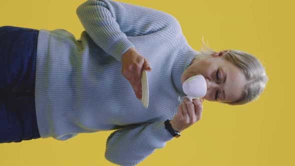 Young Woman Drinking Coffee