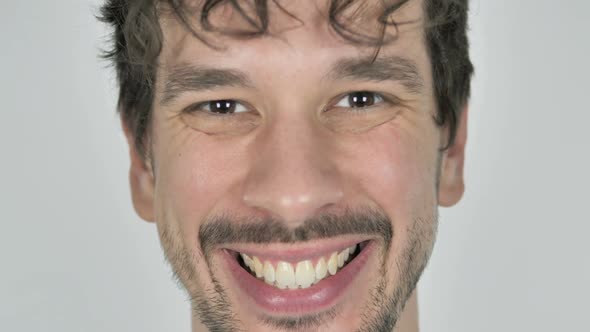 Close Up of Smiling Young Casual Man Face White Background