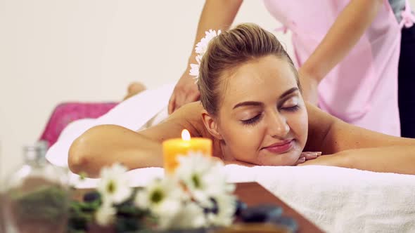 Woman Gets Back Massage Spa By Massage Therapist