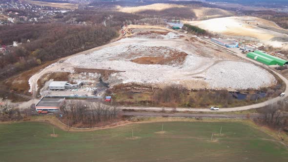 Aerial drone view of stack of different types of large mountain garbage pile