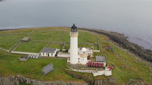 The Island of Pladda off the South Coast of Arran in Scotland with a Lighthouse