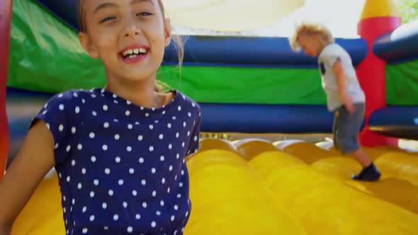 Kids playing on the bouncing castle