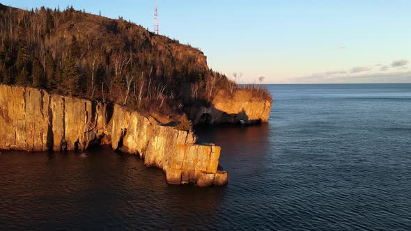 wonderful landscape aerial view during golden hour in lake superior north shore, rocky cliffs visit