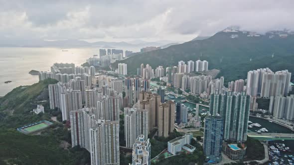Panoramic aerial view of Aberdeen Chinese City, Hong Kong under great sunlight.