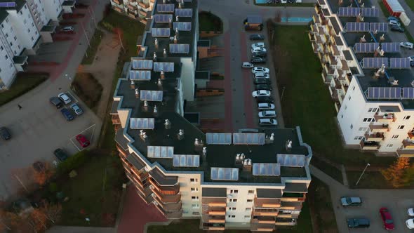 Drone Shot on Modern Multiapartment Buildings with Solar Panels on the Roofs