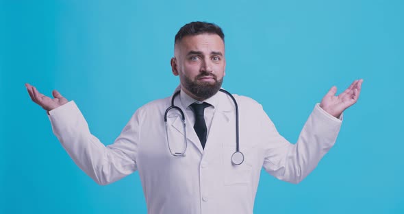 Incompetent Medical Doctor Spreading His Hands, Blue Background