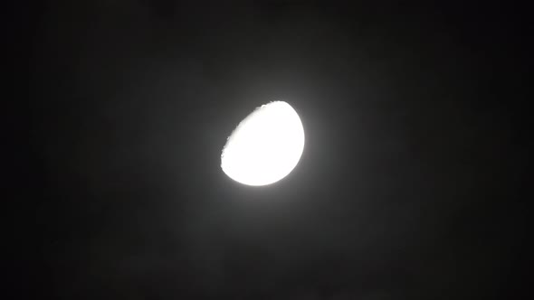 Moon with clouds in the night sky