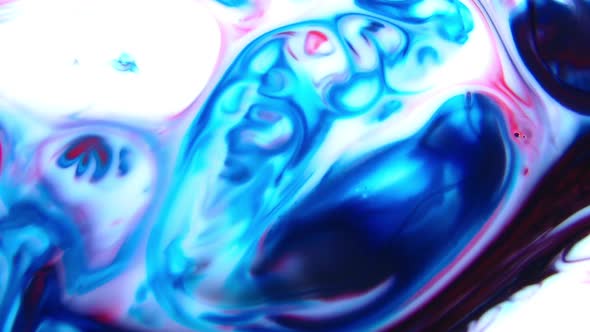 Chemical Liquid Swirl And Paint Reaction Explosion alt