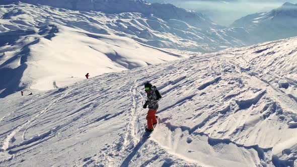 Snowboarder on the Hills