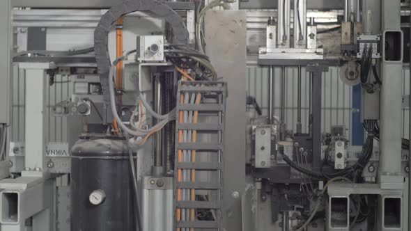 Machinery inside a glass window factory