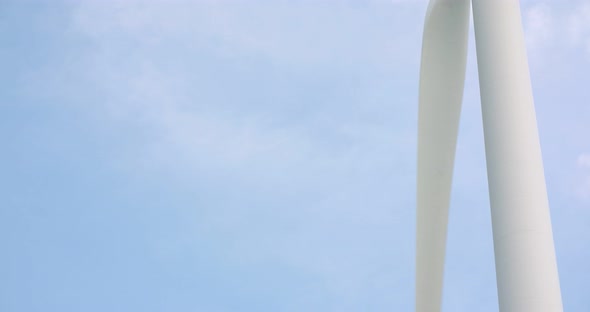 Windmill Spinning Against Sky