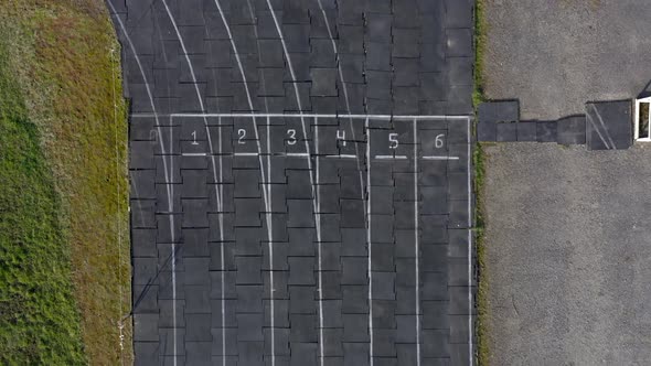 Running track texture with lane numbers, Running track background.