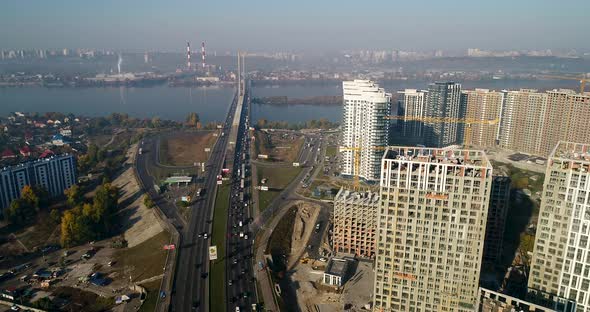 Landscape in the City with Under Construction Buildings and Industrial Cranes