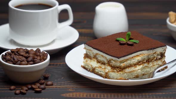 Portion of Traditional Italian Tiramisu Dessert Cup of Espresso Milk  Brown Sugar and Coffee