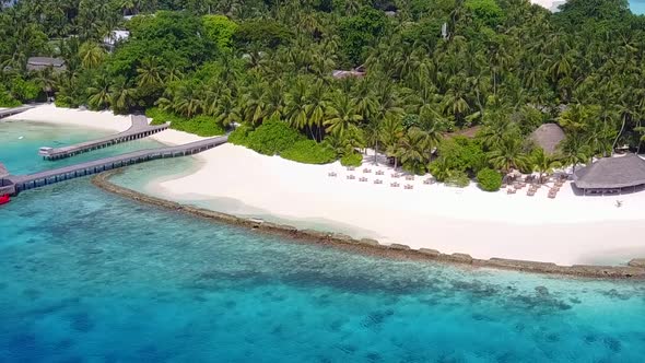 Aerial panorama of seashore beach by blue ocean and sand background