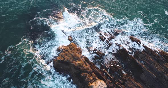 Aerial view of the edge of the rocky shore of Curtis island lighthouse Camden Maine USA