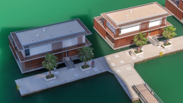 Small Houses Near Canal in Dubai UAE Aerial Timelapse