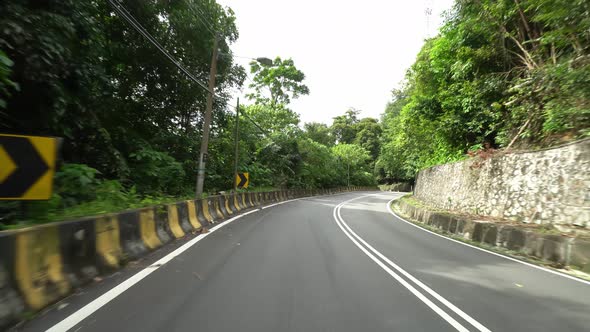 Asphalt road at forest view