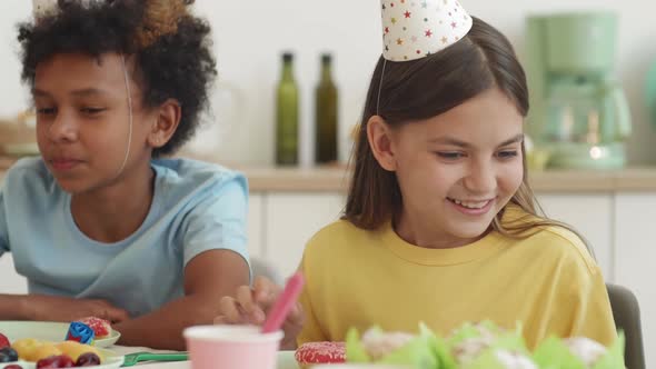 Boy and Girl Enjoying Birthday Party