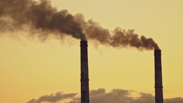 Grey smoke from pipes of metallurgy plant