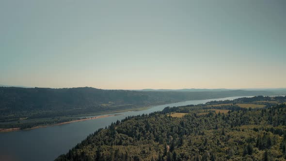 Top View of the River Which is Located Near the Forest