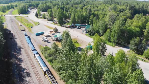 4K Drone Video of Alaska Railroad Train and Station at Talkeetna, Alaska during Sunny Summer Day