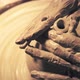 Hands of Woman Working on a Pottery Wheel. Creating a Ceramic Pot - VideoHive Item for Sale