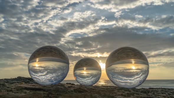 Golden Sunset Above The Sea Inside Crystal Balls.