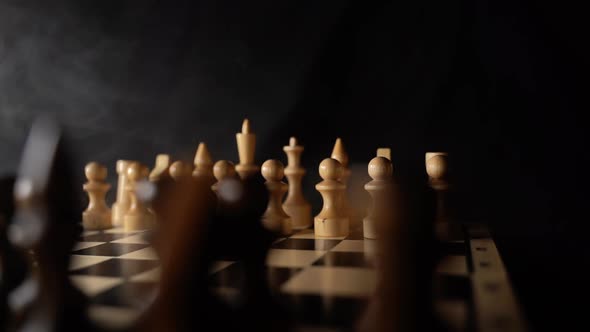 Close Up of Black Chess Pieces on Board