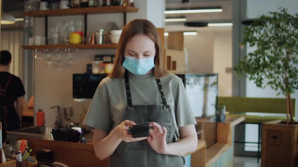 Small Business After Covid Portrait of Coffee Shop Restaurant Woman Owner with Payment Contactless