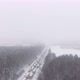 Trucks are Stuck in Traffic on a Snowcovered Highway - VideoHive Item for Sale