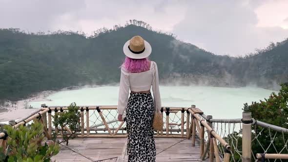 A Woman Walks Up to the Observation Deck Overlooking the Stunning Volcanic Lake