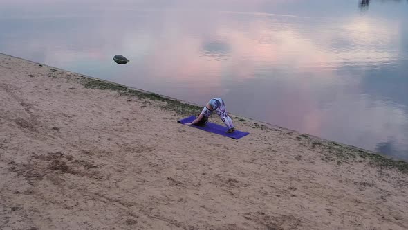 Yoga On Beach at Sunset