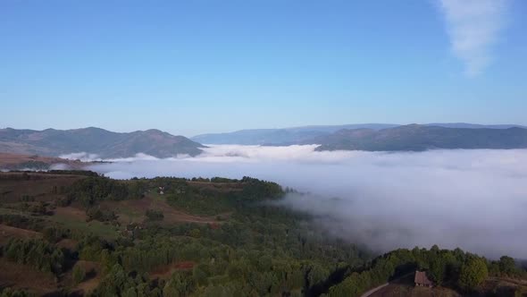 Mountain Landscape Covered In Clouds, Aerial View