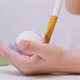 A Little Kid Learns to Paint Eggs with a Brush - VideoHive Item for Sale