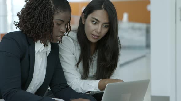 Young Businesswomen Using Laptop