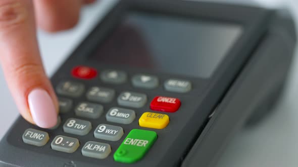 Woman Paying with Contactless Credit Card