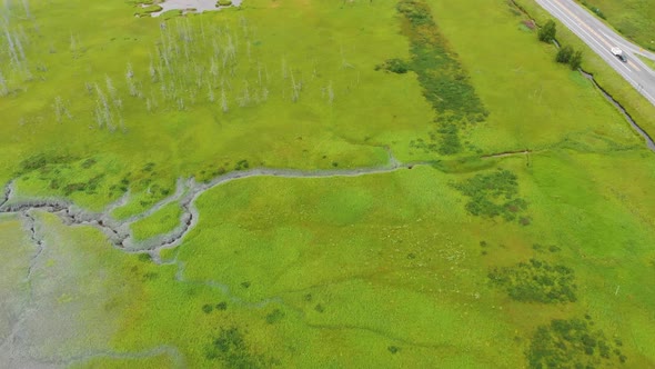 4K Cinematic Drone Video of Marsh (looking down) in Turnagain Arm Bay at Glacier Creek Near Anchorag