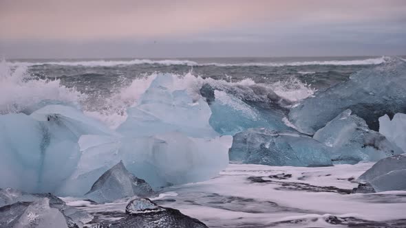 Waves Crashing Over Ice on Diamond Beach Iceland