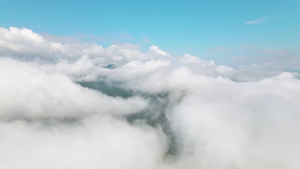 Flying in the Clouds Flying in the Clouds. The Clouds Are Moving on Camera. Flying Through the Cloud