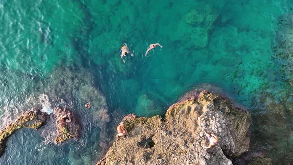 People swim in the azure sea aerial view 4 K Turkey Alanya