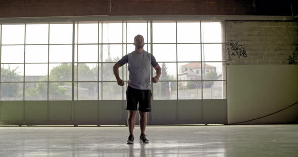 Young Adult Man Warming Up Stretching During Fitness Sport Workout