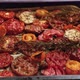 Various Kinds of Roasted Red and Yellow Tomatoes with Thyme and Garlic on an Metal Oven Tray - VideoHive Item for Sale