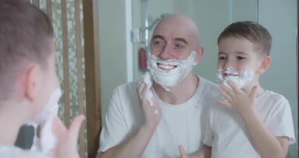 Father Teaches Son to Shave